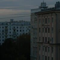 город